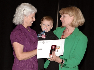 Cheri DiNovo handing out awards