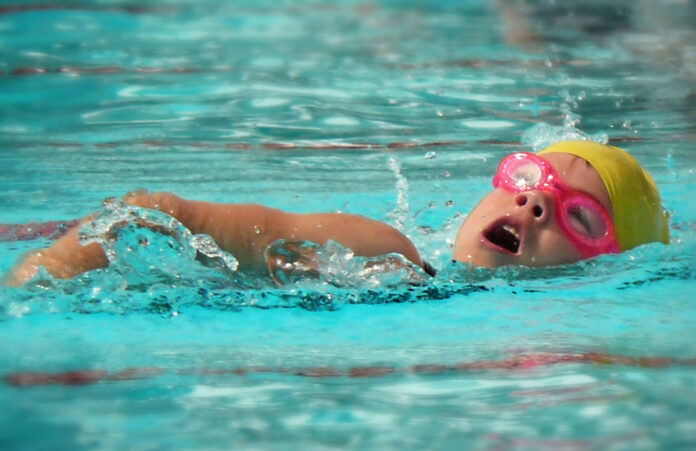 Child-Swimming-in-Pool